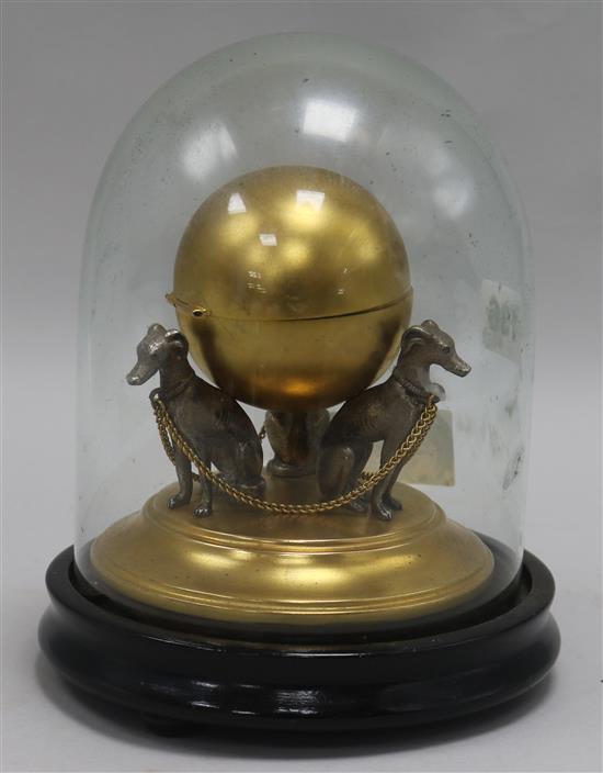 A gilt metal and silver hound inkwell, under a glass dome